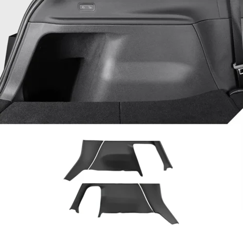 Replacement trunk side panel trim pieces laid out next to a car’s open cargo area