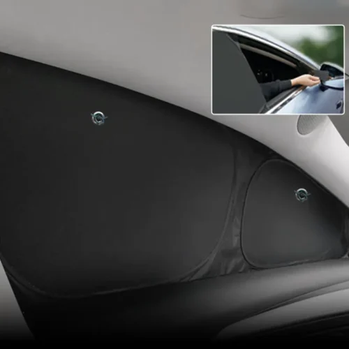 Close-up of a car's interior door panels with two circular emblem badges; inset shows a hand opening the driver door from outside.