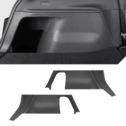 Black car trunk interior with a large side panel and two spare trim pieces laid out separately