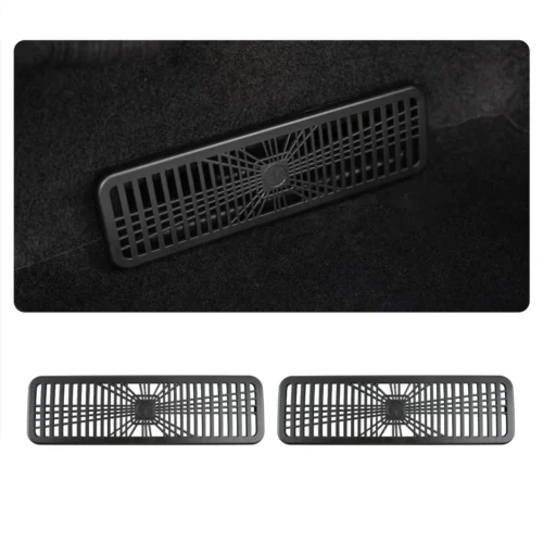 Rectangular car floor air vent/grille with a radial central hub and vertical slats, shown on a dark carpet; two similar vents below.
